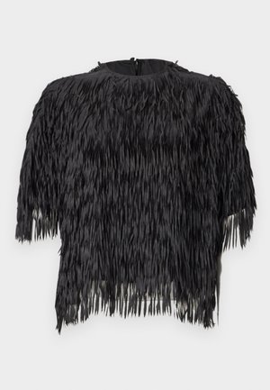 Sort cropped topp med frynsedesign laget av teksturert stoff. Rund hals med glidelås bak. Korte ermer.