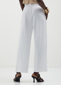 Calliope JOGGER - Pantalon classique - bianco