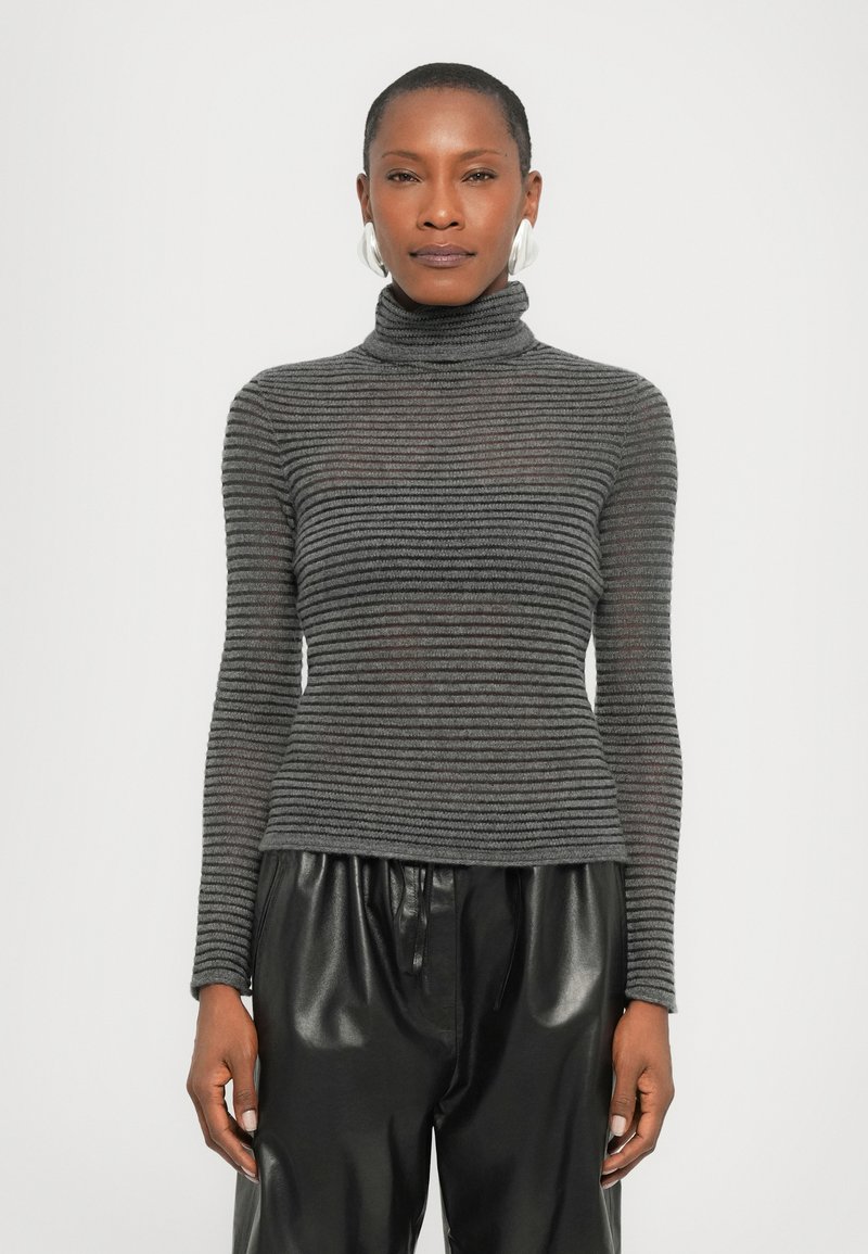 Gray striped turtleneck sweater with a fitted design, ribbed texture, and long sleeves, paired with black patent leather pants.