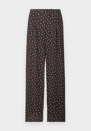 Schwarze Hosen mit weitem Bein und weißen Polka-Dots, hoher Taille und Falten unter dem Bund.