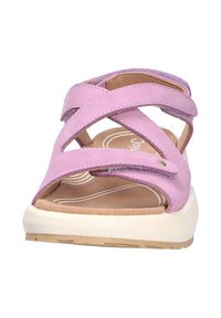 Light purple open-toe sandal with two overlapping adjustable straps and a beige cushioned sole.