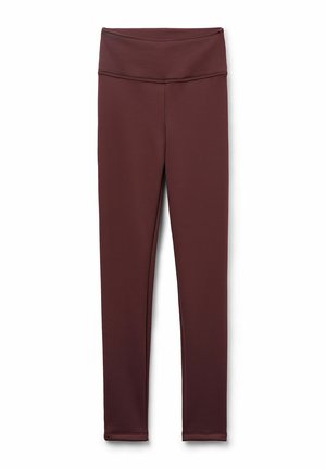 Bruna leggings med hög midja, tillverkade av stretchigt material. Snygg design utan synliga mönster eller detaljer. Slät textur.