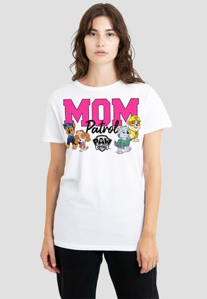 White cotton t-shirt featuring large pink "MOM" text, "Patrol" in black, and cartoon dogs from PAW Patrol in various colors.