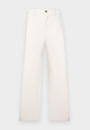 Wide-leg, beige trousers made of textured fabric. Features a front button closure and belt loops. Simple, clean design with no patterns.