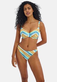 Gestreepte bikini in blauw, goud en wit. Zacht materiaal met ondersteuning van onderdraad, voorzien van brede schouderbanden en hoog uitgesneden bikinibroekjes.