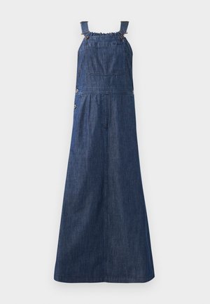 Robe salopette en denim bleu foncé avec des bretelles froncées réglables, une poche avant, des boutons sur le côté et une jupe à design fluide.