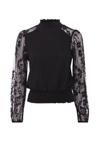 Haut noir à col montant, taille smockée et manches longues en dentelle transparente avec motifs floraux. Tissu doux avec un design structuré.