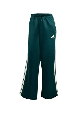 Pantalon de survêtement vert avec une coupe décontractée, une taille élastique et un cordon de serrage. Présente des rayures blanches sur les côtés et un petit logo blanc sur la jambe.