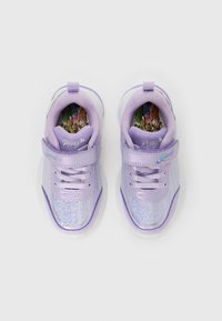 Children's shiny lavender sneakers with velcro straps and mermaid illustrations on the insoles, shown from a top view.