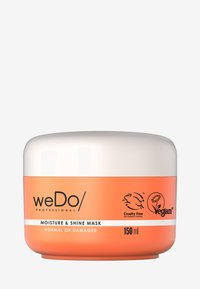 weDo/ Professionele vocht- en glansmasker in een oranje en witte ronde container van 150 ml met een plat deksel en ecovriendelijke symbolen.
