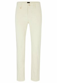 Pantaloni in cotone color crema con vestibilità slim, dotati di chiusura frontale con bottone e passanti per cintura. Texture morbida, senza motivi visibili.