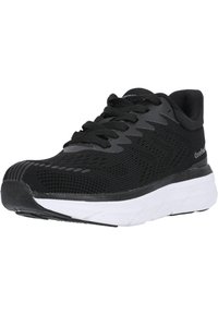 Scarpa sportiva nera con tomaia in rete testurizzata, punta arrotondata e suola intermedia bianca. Presenta lacci neri e branding sul lato.