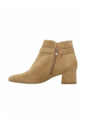 Tan suede ankle boot with side zipper, strap detail, and low block heel.