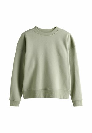 Hele roheline pusa ümmarguse kaelaauguga, langevate õlgade ja soonikkoes varrukakäänetega. Sile tekstuur ja vaba lõikega juhuslik disain.