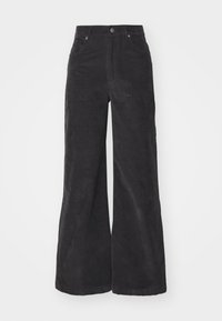 Black corduroy wide-leg trousers with a high waist, front pockets, and a button closure. The fabric features a soft, textured surface.