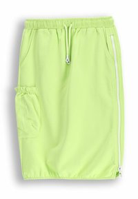Jasnozielona spódniczka sportowa uszyta z miękkiego, elastycznego materiału. Wyposażona w elastyczny pas, sznurek, boczny zamek błyskawiczny oraz boczną kieszeń.
