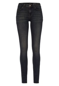 Jean skinny noir avec légère décoloration, poches avant et fermeture par bouton, présenté sur un fond blanc.