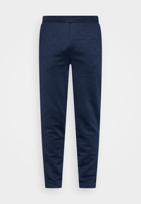 Pantalones de chándal azul marino con un patrón de diamantes texturizado, cinturilla elástica y diseño ajustado. Sin bolsillos visibles ni detalles de hardware.