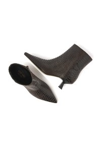 Brown faux snake-skin ankle boots with a pointed toe and a short tapered heel. Smooth texture with a reptile pattern. Zipper closure.