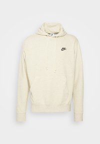 Beige mramorovaná mikina Nike s kapucí, šňůrkami, klokaní kapsou a černým logem Nike na levé části hrudi, dlouhými rukávy a žebrovanými manžetami.