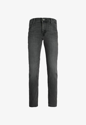 Granatowa bluza polarowa z napisem "ORIGINALS", zestawiona z dopasowanymi szarymi dżinsami i czarno-białymi tenisówkami. Miękka faktura i luźny krój.