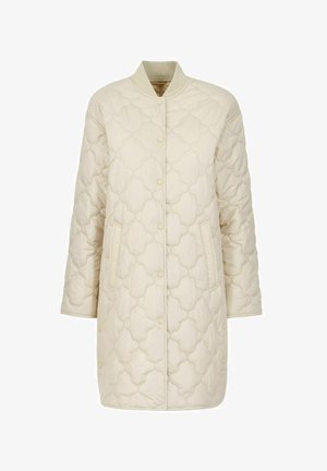 Kurtka pikowana w kolorze beżowym z okrągłym kołnierzem, zapinana na zatrzaski, z dwoma bocznymi kieszeniami oraz teksturowanym wzorem z krzywymi kształtami.