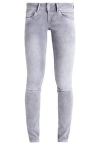 Světle šedé skinny dž íny vyrobené z denimu s hladkou texturou, obsahující dvě přední kapsy, zip a knoflík na zapínání a poutka na pásek.