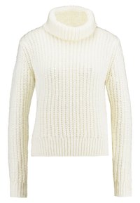 Cream-colored sweater with a chunky knit texture and a high turtleneck. Features ribbed cuffs and hem for a snug fit.