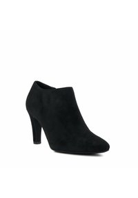 Bottes noires en suède à talon aiguille de 3 pouces, avec un bout pointu et un design minimaliste.