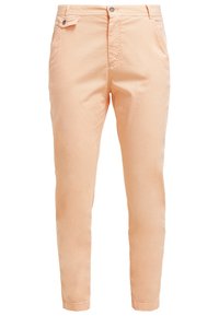 Jasno brzoskwiniowe chinosy o slim fit, wykonane z materiału bawełnianego. Posiadają zapięcie na guzik z przodu, dwie boczne kieszenie oraz podwinięte mankiety.