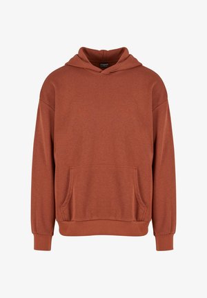 Kapuljača boje hrđe, mekani materijal, opušteni kroj, kapuljača sa čipkom, prednji kengur džep, duge rukave sa rebrastim manžetama i donjim rubom.