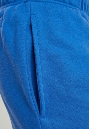 Urban Classics Tracksuit bottoms - royal
