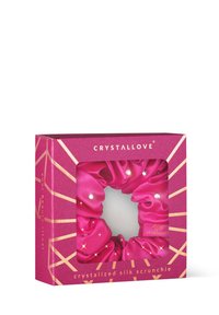 Różowy, skrystalizowany jedwabny scrunchie w przezroczystym pudełku z oknem, z złotymi akcentami i geometrycznymi wzorami; zawiera dekoracyjne kryształy na tkaninie.