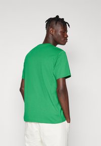 Converse RETRO CHUCK SIMPLY VINTAGE UNISEX - Camiseta estampada - green