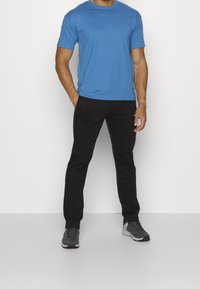 Champion Träningsbyxor - black