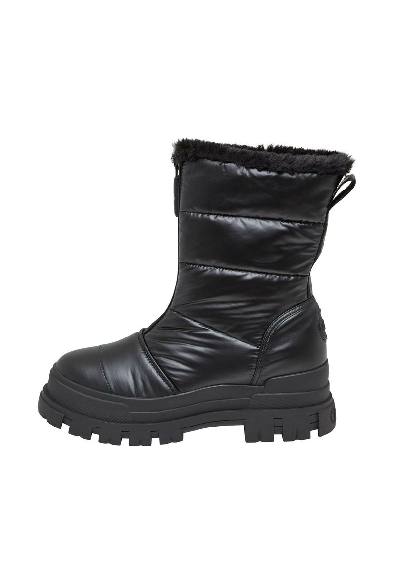 Black winter boot with a glossy, quilted finish, faux fur trim at the top, thick rubber sole, and pull tab for easy wear.