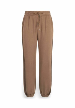 Pantaloni della tuta marroni con vita regolabile, tasche laterali e dettagli in rete. I polsini affusolati alle caviglie offrono una vestibilità aderente.