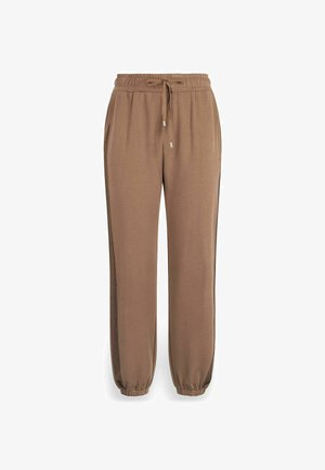 Pantaloni della tuta marroni con vita regolabile, tasche laterali e dettagli in rete. I polsini affusolati alle caviglie offrono una vestibilità aderente.