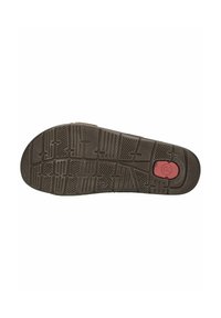 Suela de zapato de goma marrón con patrones texturizados y un acento rojo cerca del talón para mayor tracción y agarre.