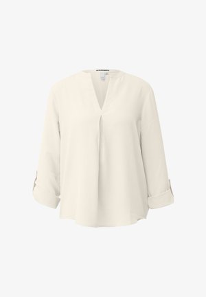 Blusa crema a maniche lunghe dal taglio ampio, con scollo a V e polsini risvoltati.