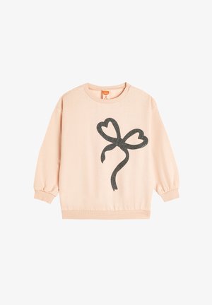 Lichtroze sweatshirt, zachte textuur, relaxte pasvorm, met een zwart glinsterende hartvormige strikafbeelding op de voorkant, ribgebreide manchetten en zoom.