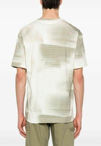 Calvin Klein DIFFUSED GRID AOP - T-shirt con stampa - beige khaki
