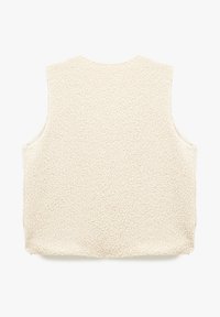 Beige ilmanhihaista sherpa fleece -liiviä, jossa on pehmeä ja tekstuurinen pinta, esitetty takaa valkoista taustaa vasten.