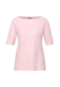 Blouse pour femme à manches courtes de couleur rose clair, avec un col rond et une coupe décontractée, présentée sur un fond blanc.