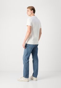 Calvin Klein Jeans HEAVY REGULAR  - Jednoduché tričko - ivory