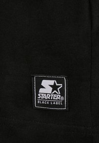 Starter ESSENTIAL  - Topper langermet - black