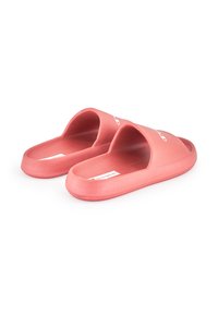 Pink waterproof slide sandals with a smooth finish, open-toe design, and a textured insole. Features a logo on the strap.