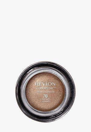 Revlon Colorstay Creme-Eyeshadow in einem klaren Tiegel. Die Farbe ist Karamellbraun mit einem schimmernden Finish, einer strukturierten und cremigen Erscheinung.