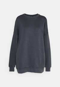 Felpa grigia scura realizzata in morbido misto cotone. Presenta un collo tondo, spalle basse e polsini e fondo a costine. Tessuto liscio, design casual.