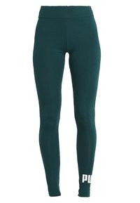 Ciemnozielone legginsy wykonane z elastycznego materiału, z wysokim stanem. Posiadają gładki design i białe logo na dolnej części nogawki.